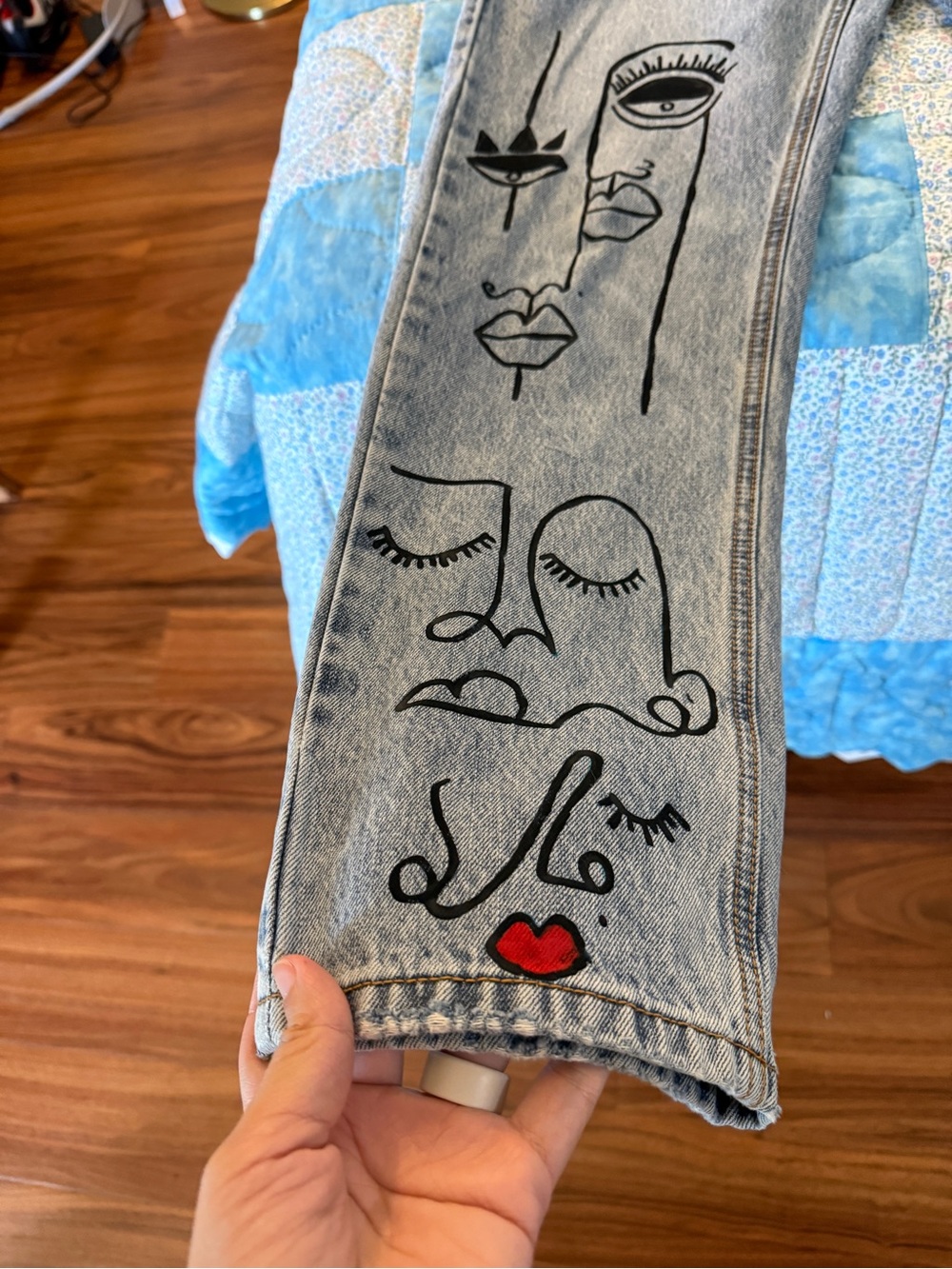 Fashion Nova Light Grey Skinny Jeans with Black Face Line Art and Red Lip Accent